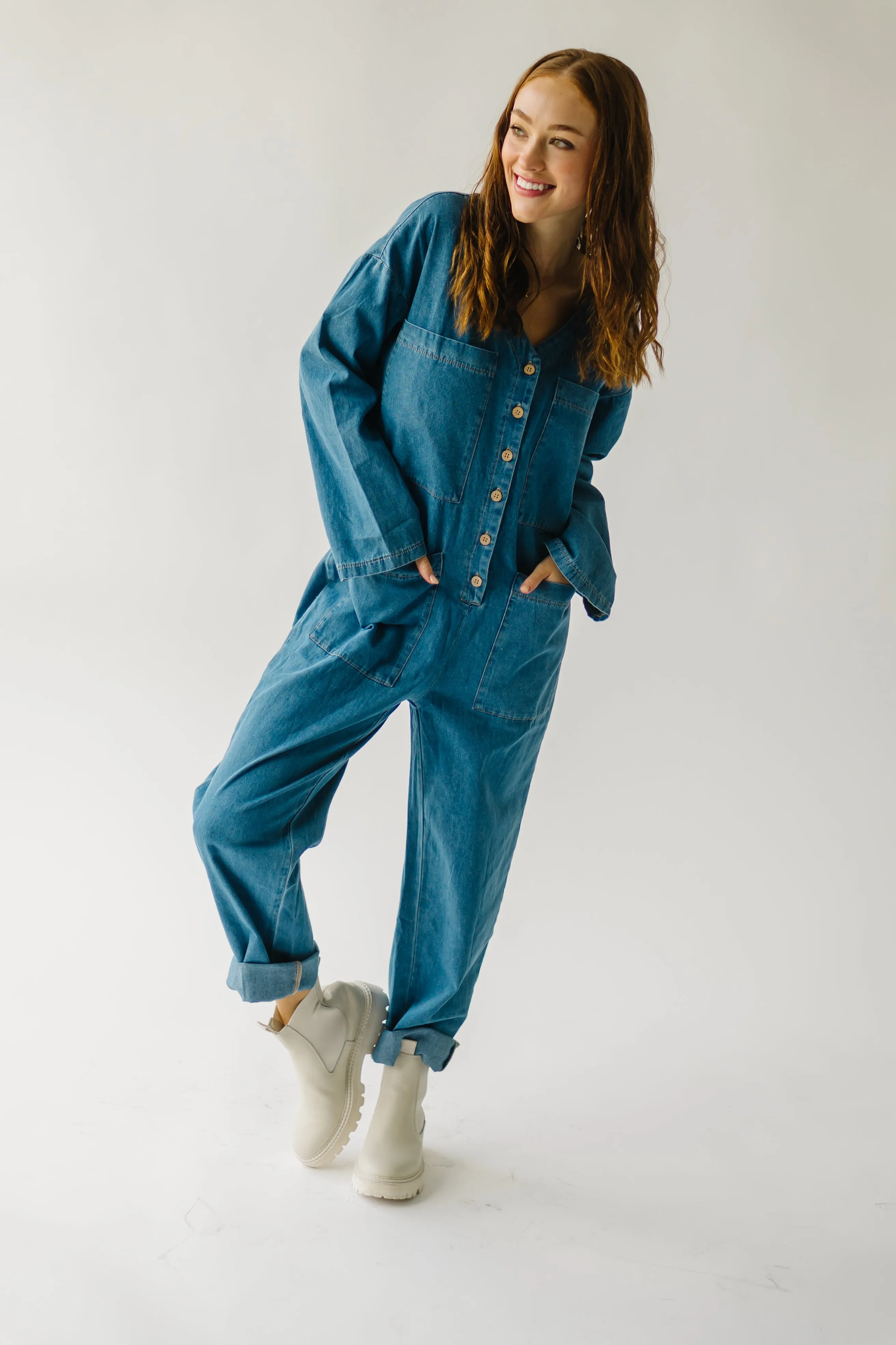 The Adeline Button-Down Jumpsuit in Washed Denim